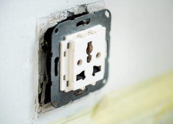 Closeup of AC power plug socket